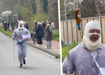 VIDEO: Man loopt marathon van Enschede met bierinfuus in zijn hand