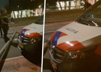 header x politie busje en paal