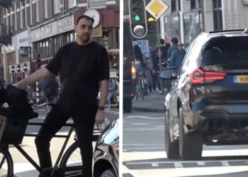 VIDEO: Jongen op fiets is luide auto’s in Amsterdam zat en grijpt in